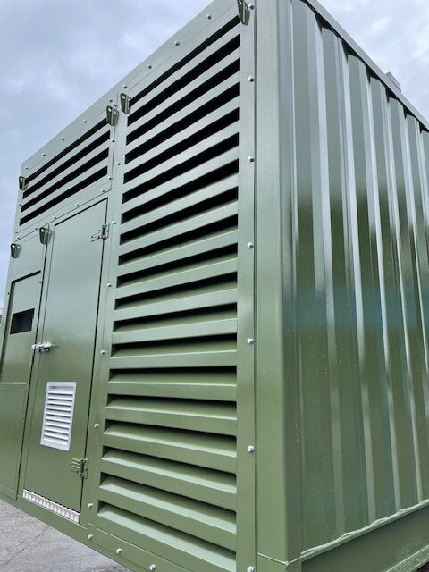 Sound-attenuated generator enclosure with louvred cladding