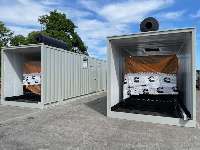 Twin generator enclosures with wrapped gensets ready for install